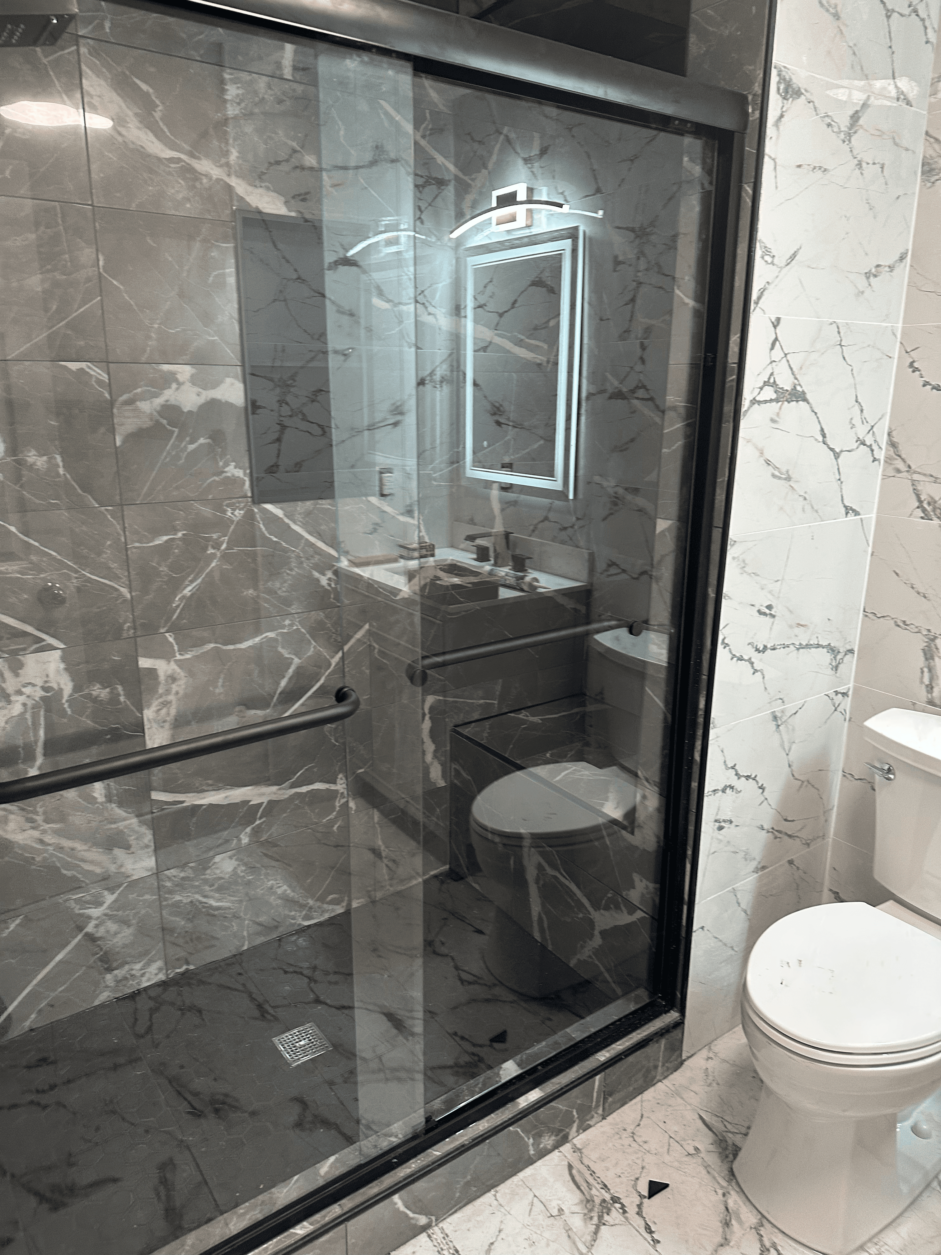 Kitchen and bathroom remodeling work by Lansing Concrete and Remodeling